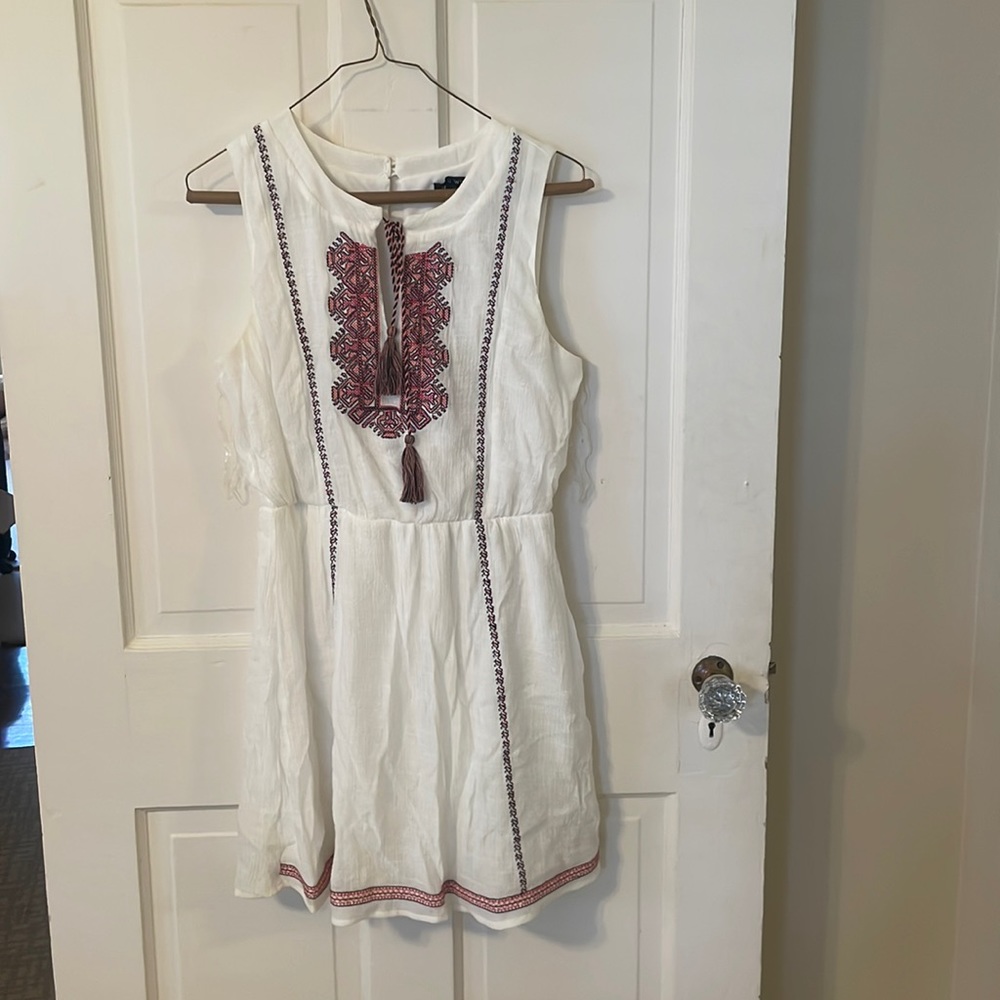 Western style white dress with ornate embroidery.